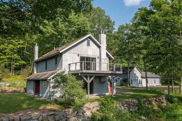 178 Carter Rd, Kent, CT 06754 - rear view of house with a chimney and a balcony