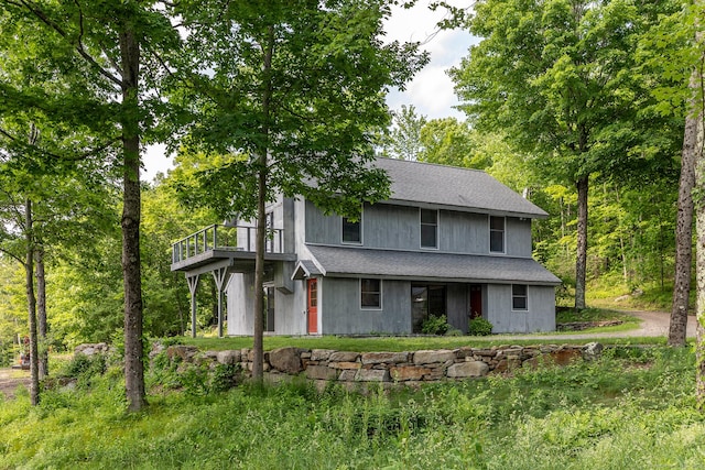 178 Carter Rd, Kent, CT 06754 - view of front of property featuring a shingled roof and a wooden deck