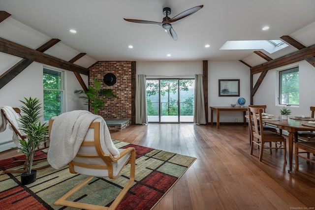 178 Carter Rd, Kent, CT 06754 - living area with vaulted ceiling, a skylight, healthy amount of natural light, ceiling fan, and hardwood / wood-style flooring