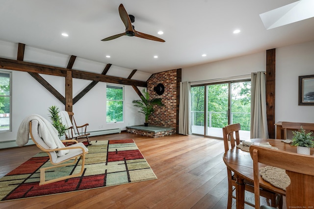 178 Carter Rd, Kent, CT 06754 - living area with plenty of natural light, wood finished floors, vaulted ceiling, recessed lighting, and a skylight
