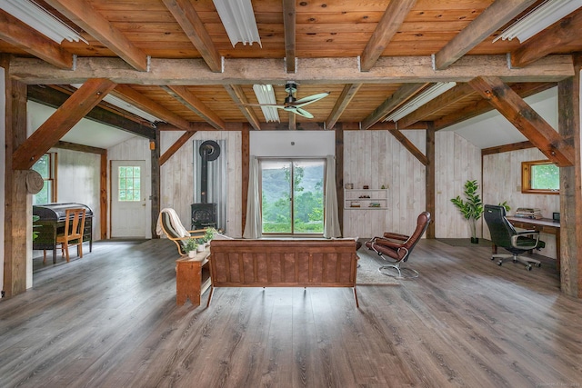 178 Carter Rd, Kent, CT 06754 - living room with a wood stove, wood finished floors, ceiling fan, and beamed ceiling