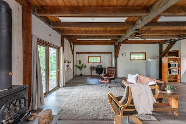 178 Carter Rd, Kent, CT 06754 - living area featuring a wood stove, wood finished floors, ceiling fan, and a wood ceiling with exposed beams