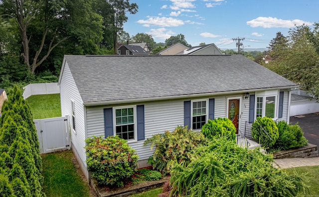 30 Lewis Rd, Bristol, CT 06010 - view of front of house with a shingled roof and a gate