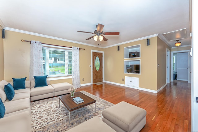 30 Lewis Rd, Bristol, CT 06010 - living area featuring attic access, a ceiling fan, hardwood / wood-style floors, and ornamental molding