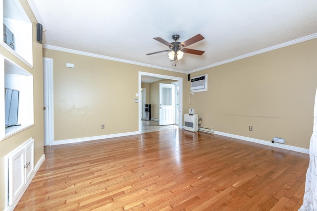 30 Lewis Rd, Bristol, CT 06010 - spare room with ceiling fan, ornamental molding, light wood finished floors, a wall mounted air conditioner, and a baseboard heating unit