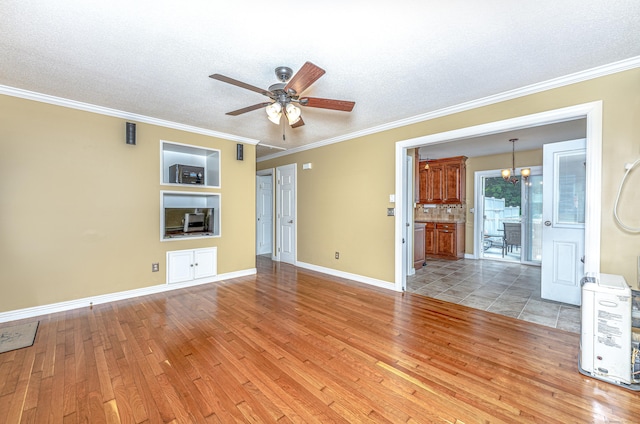 30 Lewis Rd, Bristol, CT 06010 - empty room with light wood-type flooring, ceiling fan, crown molding, a chandelier, and a textured ceiling