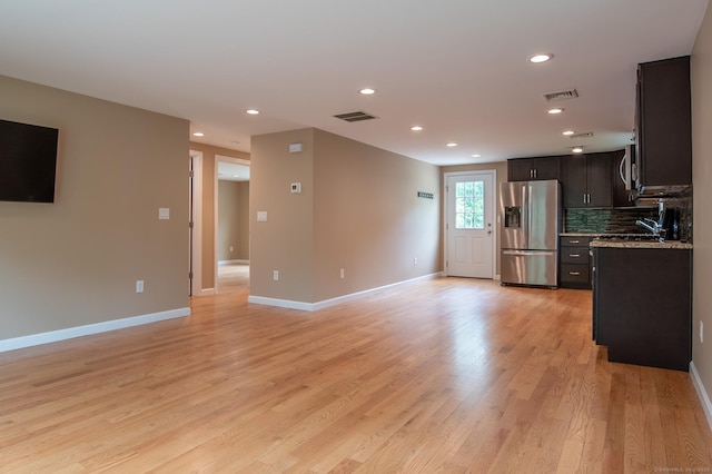 11 Breaults Landing Rd, Thompson, CT 06277 - kitchen with stainless steel appliances, recessed lighting, light wood finished floors, open floor plan, and tasteful backsplash