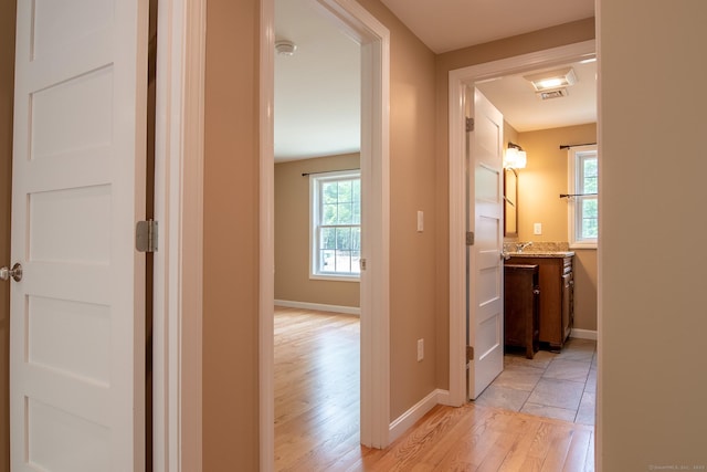 11 Breaults Landing Rd, Thompson, CT 06277 - hall featuring light wood-type flooring and plenty of natural light