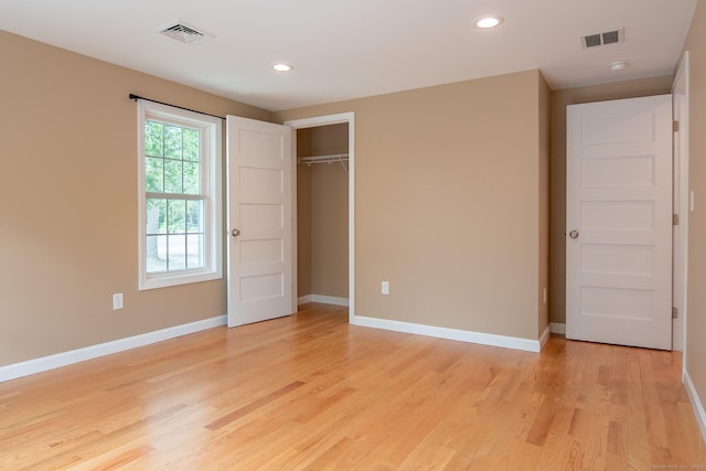 11 Breaults Landing Rd, Thompson, CT 06277 - unfurnished bedroom with light wood-style floors and recessed lighting
