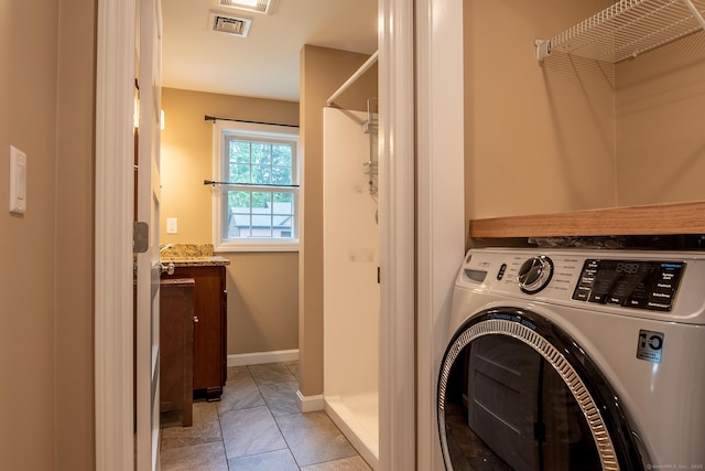 11 Breaults Landing Rd, Thompson, CT 06277 - washroom featuring washer / dryer and baseboards
