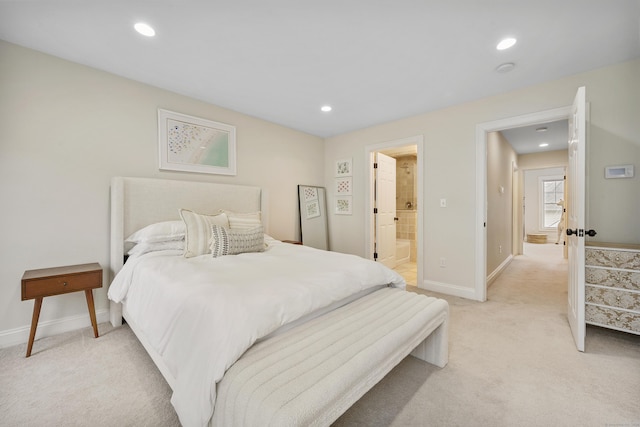 85 Camp Ave Apt 11J, Stamford, CT 06907 - bedroom with light carpet, recessed lighting, and connected bathroom