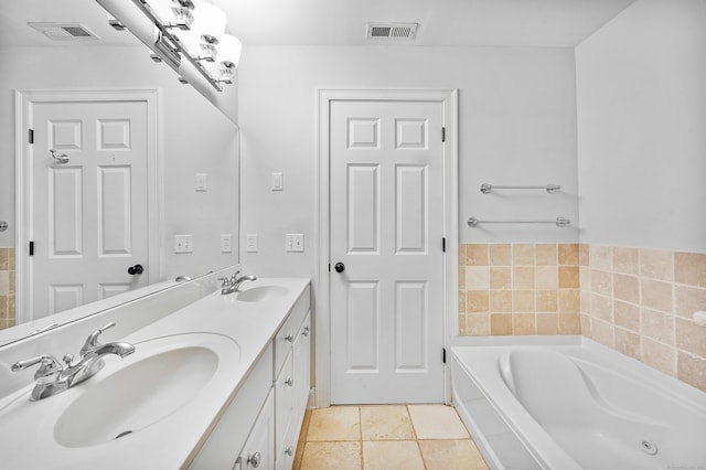 85 Camp Ave Apt 11J, Stamford, CT 06907 - bathroom featuring a bath, double vanity, and tile patterned flooring