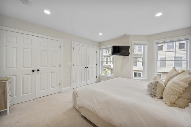85 Camp Ave Apt 11J, Stamford, CT 06907 - bedroom with multiple closets, carpet, and recessed lighting