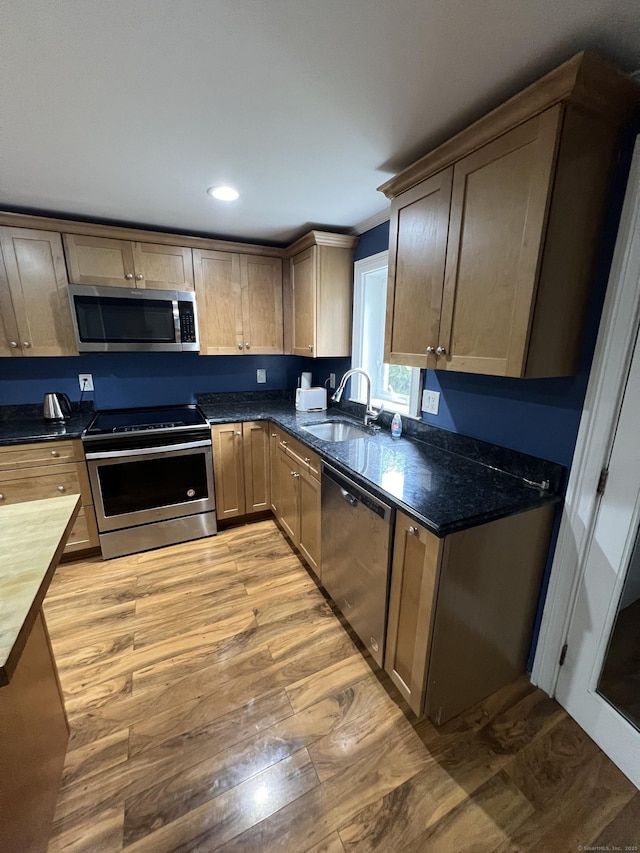 51 Brook St Apt 3C, Naugatuck, CT 06770 - kitchen with stainless steel appliances, light wood-style floors, a sink, recessed lighting, and wooden counters