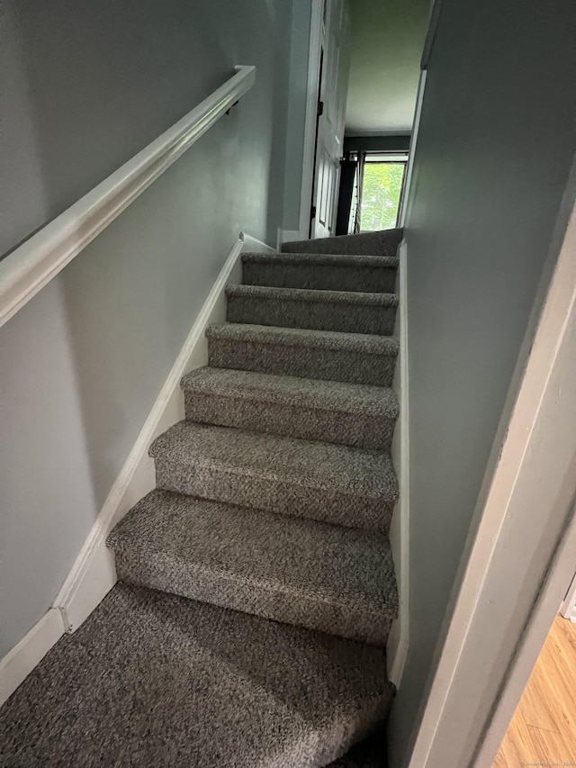 51 Brook St Apt 3C, Naugatuck, CT 06770 - staircase with baseboards