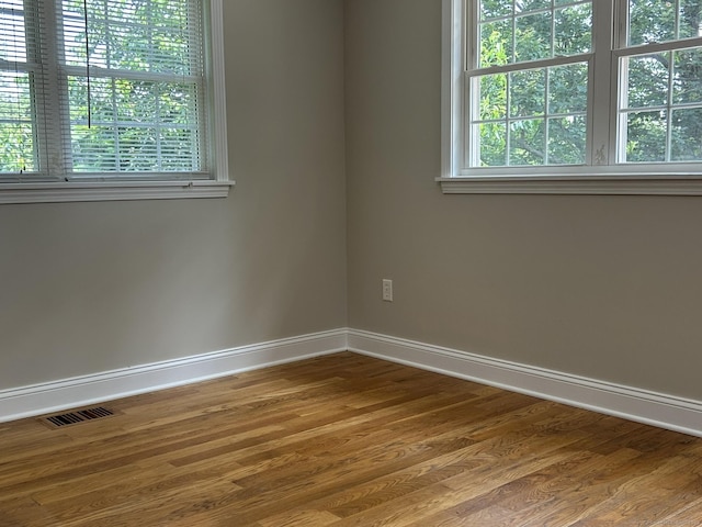 756 Hart St, Bridgeport, CT 06606 - empty room with wood finished floors