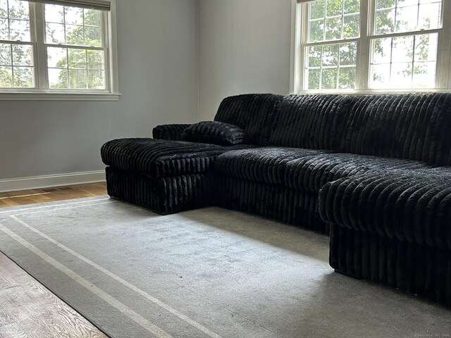 756 Hart St, Bridgeport, CT 06606 - living area featuring wood finished floors and baseboards