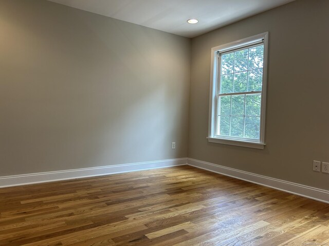756 Hart St, Bridgeport, CT 06606 - spare room with wood finished floors and recessed lighting