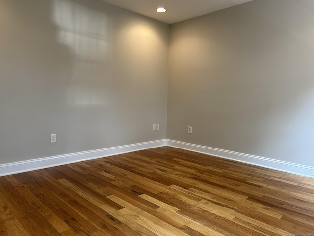 756 Hart St, Bridgeport, CT 06606 - empty room featuring dark wood finished floors and recessed lighting