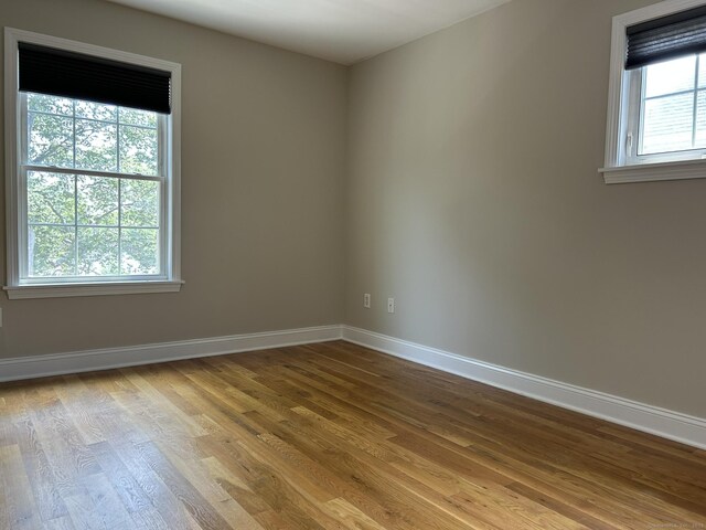 756 Hart St, Bridgeport, CT 06606 - unfurnished room with wood finished floors and baseboards