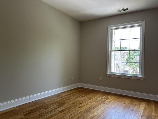 756 Hart St, Bridgeport, CT 06606 - spare room featuring wood finished floors and baseboards
