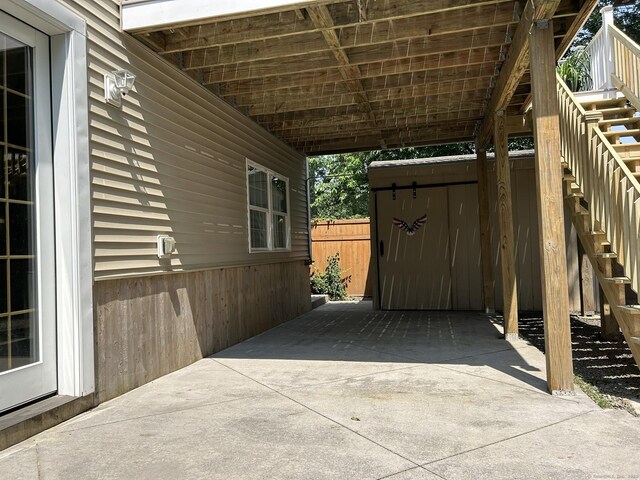 756 Hart St, Bridgeport, CT 06606 - view of patio / terrace with stairs and a carport