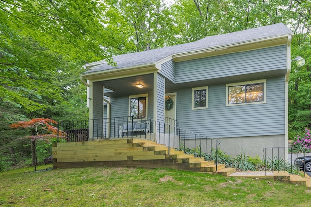 11 Wood Duck Ln Unit 11, Simsbury, CT 06081 - view of front of property with stairway, a shingled roof, and a porch