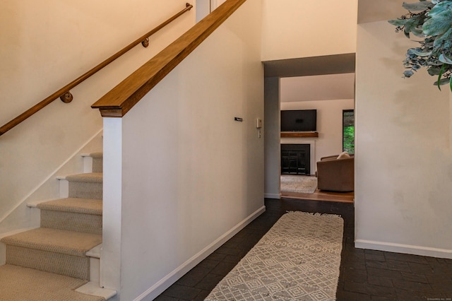 11 Wood Duck Ln Unit 11, Simsbury, CT 06081 - staircase with a fireplace and baseboards