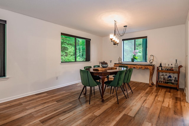 11 Wood Duck Ln Unit 11, Simsbury, CT 06081 - dining space featuring hardwood / wood-style floors and a chandelier