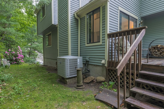 11 Wood Duck Ln Unit 11, Simsbury, CT 06081 - view of property exterior with a central AC unit and a wooden deck