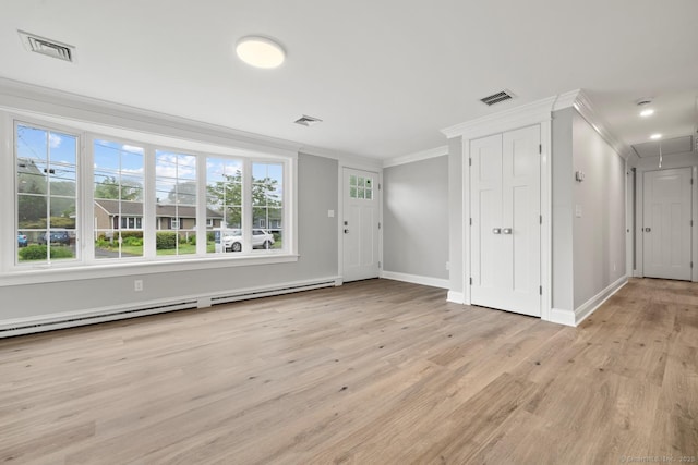 8 Edwards Rd, Old Saybrook, CT 06475 - unfurnished living room with crown molding, attic access, light wood-type flooring, plenty of natural light, and a baseboard radiator