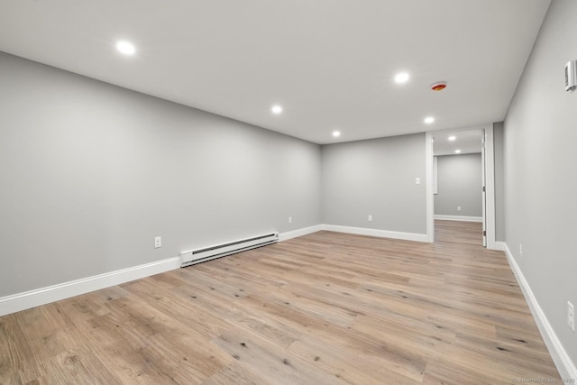 8 Edwards Rd, Old Saybrook, CT 06475 - unfurnished room featuring a baseboard heating unit, recessed lighting, and light wood finished floors