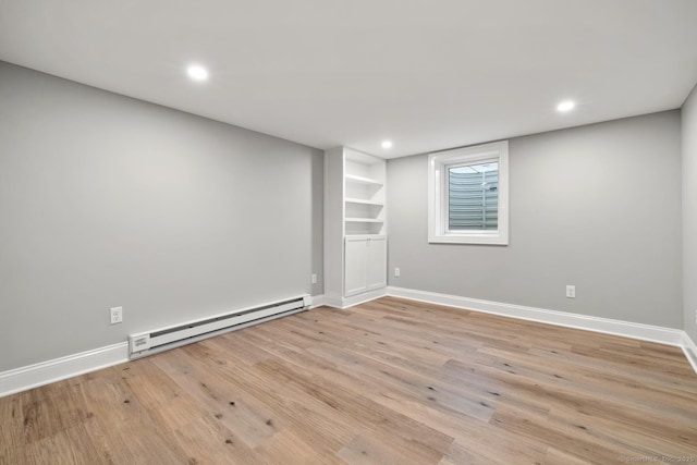 8 Edwards Rd, Old Saybrook, CT 06475 - finished basement featuring baseboard heating, light wood finished floors, and recessed lighting