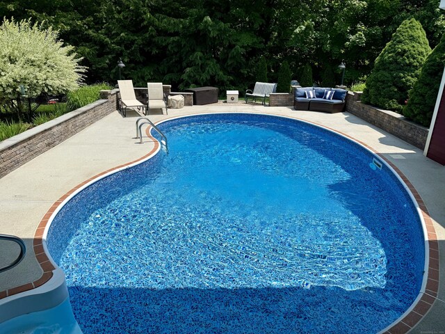 81 Jan Rd, Bristol, CT 06010 - swimming pool featuring a patio area