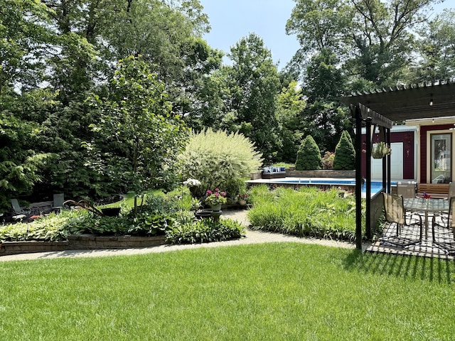 81 Jan Rd, Bristol, CT 06010 - view of green lawn featuring an outdoor pool, a pergola, and a patio