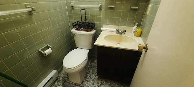 75 Hunter Ct Unit 75, Torrington, CT 06790 - bathroom featuring vanity, tile walls, and baseboard heating