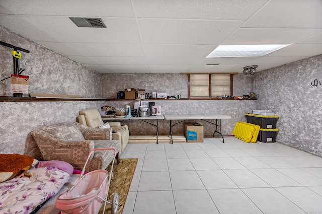 30 S Dale St, East Haven, CT 06513 - below grade area with a drop ceiling and tile patterned floors