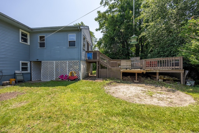 30 S Dale St, East Haven, CT 06513 - back of property featuring a lawn and a wooden deck