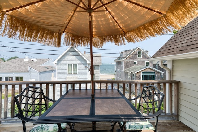 7 Crescent Ave, East Lyme, CT 06357 - wooden deck featuring outdoor dining area and a water view