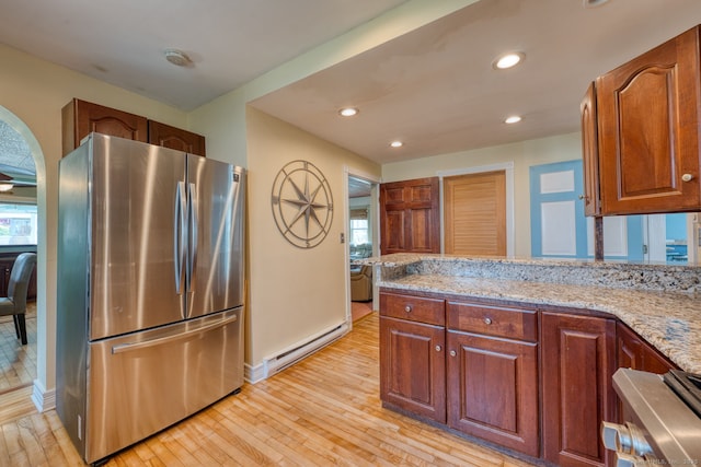 7 Crescent Ave, East Lyme, CT 06357 - kitchen featuring freestanding refrigerator, baseboard heating, light wood-style floors, light stone countertops, and recessed lighting