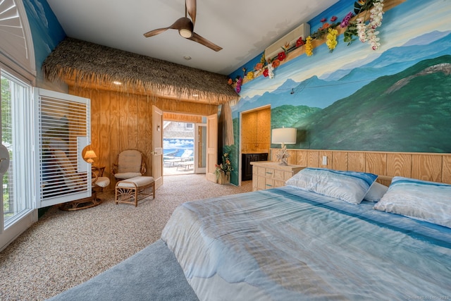 7 Crescent Ave, East Lyme, CT 06357 - bedroom with light colored carpet, wooden walls, and a ceiling fan