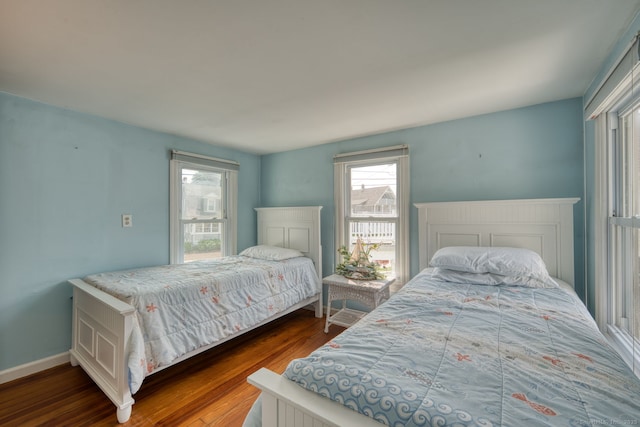 7 Crescent Ave, East Lyme, CT 06357 - bedroom featuring dark wood-style floors and baseboards