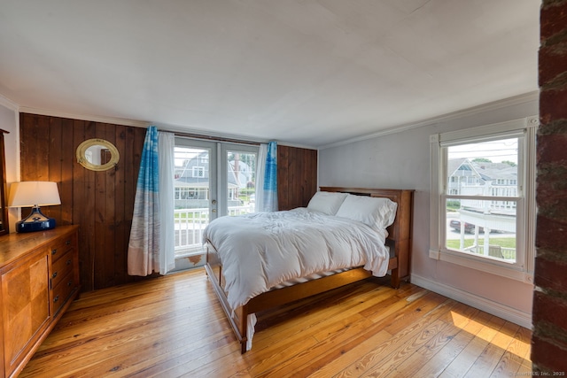 7 Crescent Ave, East Lyme, CT 06357 - bedroom featuring access to outside, multiple windows, light wood finished floors, french doors, and ornamental molding