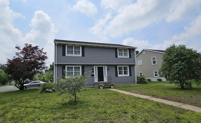 258 Eddy Glover Blvd, New Britain, CT 06053 - colonial home featuring a front yard