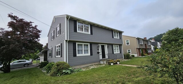 258 Eddy Glover Blvd, New Britain, CT 06053 - view of front of house featuring a front yard