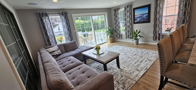 258 Eddy Glover Blvd, New Britain, CT 06053 - living room featuring baseboards, light wood-style flooring, and recessed lighting
