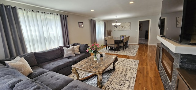 258 Eddy Glover Blvd, New Britain, CT 06053 - living room with a chandelier, wood finished floors, and recessed lighting
