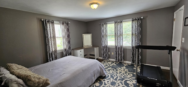258 Eddy Glover Blvd, New Britain, CT 06053 - bedroom featuring multiple windows and baseboards