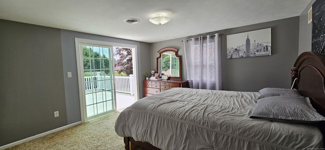 258 Eddy Glover Blvd, New Britain, CT 06053 - carpeted bedroom with access to exterior and baseboards