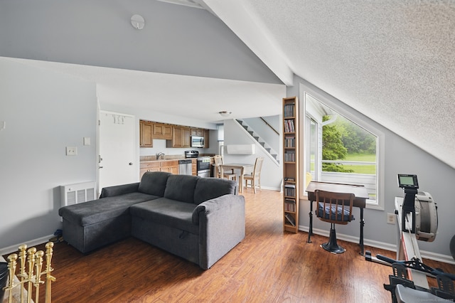 22 River Colony, Guilford, CT 06437 - living area with lofted ceiling, stairs, a textured ceiling, and wood finished floors